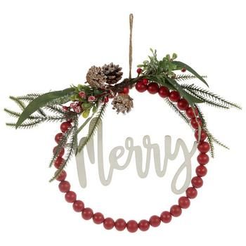 a red beaded christmas ornament with pine cones, berries and greenery