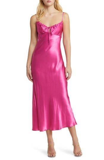 This slinky slipdress is crafted in glossy satin with a tied and cutout back. V-neck Spaghetti straps 100% viscose Machine wash, line dry Imported Satin Midi Dress With Tie Back For Brunch, Strappy Back Satin Slip Dress For Party, Sleek Halter Neck Satin Slip Dress, Summer Satin Halter Neck Slip Dress, Pink Tie Back Slip Dress For Party, Satin Dress With Strappy Back For Date Night, Date Night Slip Dress With Tie Back, Glamorous Silk Slip Dress With Spaghetti Straps, Satin Backless Midi Dress