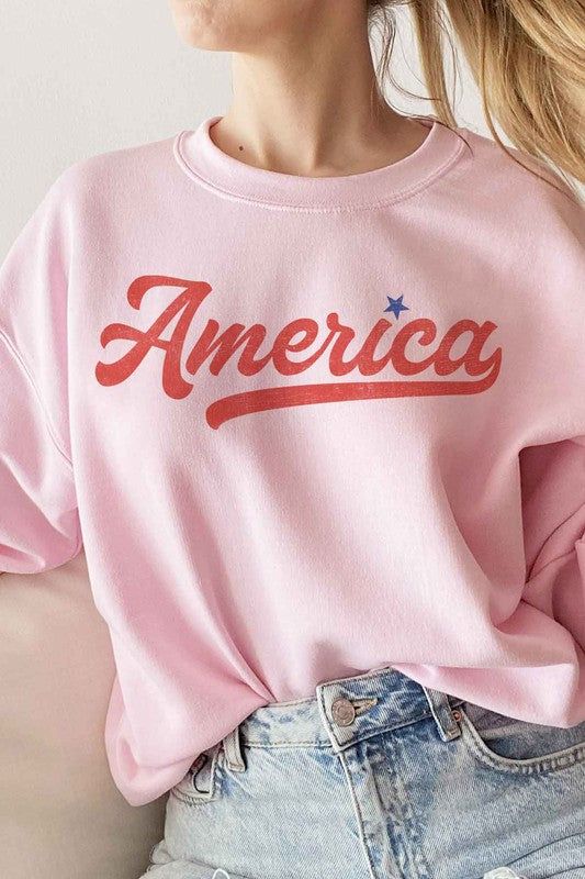 America Graphic Sweatshirt  Premium Cotton Unisex Sizing Classic Fit    Made In : Usa Pink Long Sleeve T-shirt With Text Print, Pink Long Sleeve Slogan Top, Pink Long Sleeve Top With Slogan, Pink Sporty T-shirt For Fall, Casual Pink Sweatshirt With Logo Print, Pink Long Sleeve Slogan Sweatshirt, Pink Long Sleeve Sweatshirt With Slogan, Pink Relaxed Fit Slogan Tops, Pink Relaxed Fit Tops With Slogan