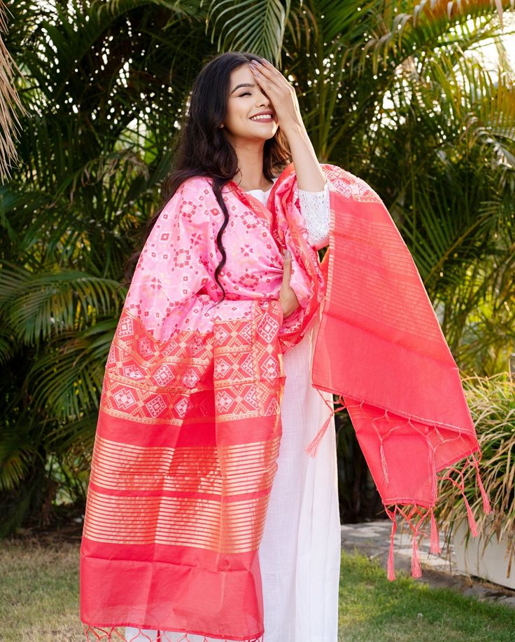 Celebrate any occasion in style with our silk blend patola dupatta. Crafted with care, each piece is elegant and unique. Enjoy the exclusivity of our limited edition collections and savor the slow fashion journey with us. Care: Consider dry cleaning or hand washing as preferable options, as machine washing may increase the likelihood of damaging the dupatta. Dupatta Length: Approx 2 meters * 0.5 metersUsage: Evening, Weddings, Festivals, Parties or any other special occasions.Perfect Gifting Solution: They also make ideal gifts for daughters, mothers, grandmothers, colleagues, partners, students, girlfriends, brides, bridesmaids, wives, wedding gifts, Ramadan, Eid gifts, Diwali Our soft and luxurious Patola cotton-silk dupatta, is perfect for any occasion. This dupatta is the perfect acces Festive Slub Silk Dupatta, Traditional Pink Anarkali Set In Cotton Silk, Diwali Slub Silk Dupatta, Pink Cotton Silk Traditional Wear With Dupatta, Handloom Slub Silk Anarkali Set, Multicolor Slub Silk Dupatta, Handloom Cotton Silk Anarkali Set, Festive Katan Silk Dupatta With Ikat Print, Festive Ikat Print Katan Silk Dupatta