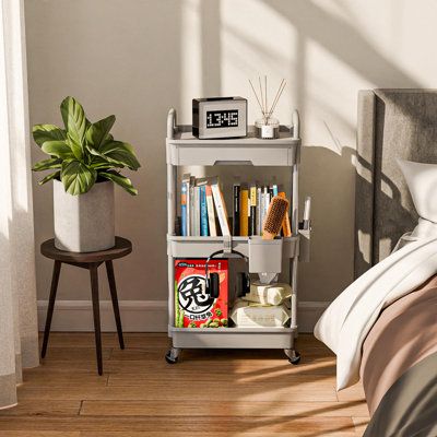 a bed room with a neatly made bed and a book shelf