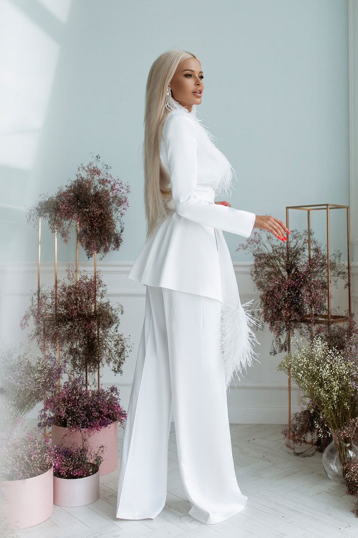 White Satin Oversized Pantsuit With Feathers. – SandraBlush Glamorous Long Sleeve Evening Suit, Glamorous Tailored Long Sleeve Suits, Party Tuxedo Pantsuit With Long Sleeves, Glamorous Tailored Wedding Suits, Long Sleeve Satin Suits For Evening, Satin Long Sleeve Suits For Evening, Glamorous Long Sleeve Pantsuit For Evening, Tailored Long Sleeve Pantsuit For Party, Evening Satin Suits With Long Sleeves