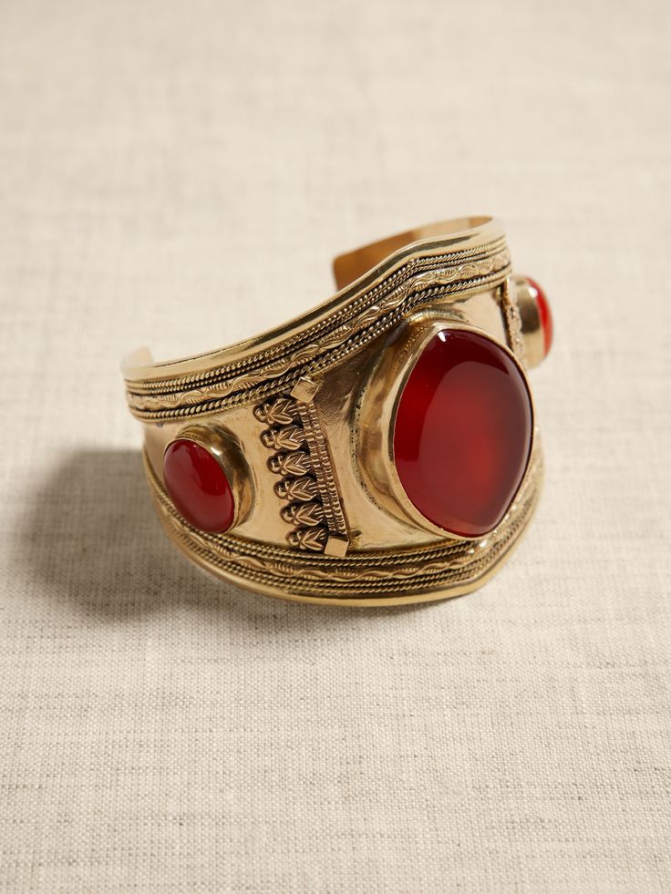 STORIED VOYAGES COLLECTION: In the ancient lore of Sumeria and Egypt, carnelian was favored as the stone of royalty, associated with the Egyptian goddess, Isis.  Span the seasons with golden brass set against spirited stones of flaming russet carneli Vintage Indian Jewelry, Ancient Roman Jewelry, Egyptian Bracelet, Egypt Jewelry, Roman Jewelry, Headpiece Jewelry, Egyptian Jewelry, Greek Jewelry, Egyptian Goddess