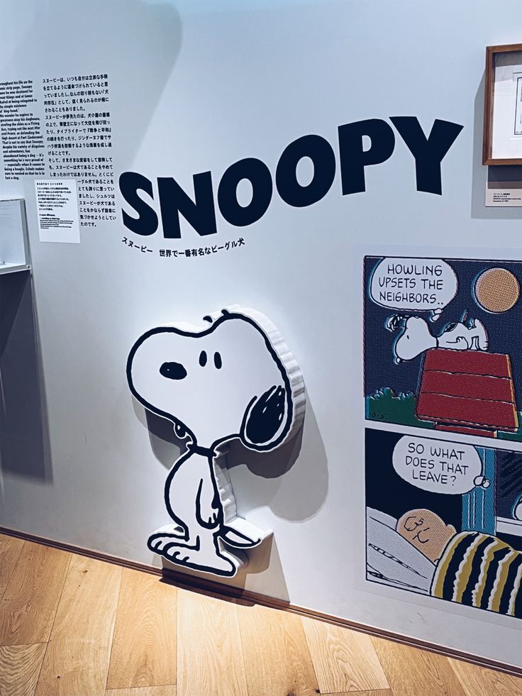 a snoopy cartoon on display in a museum