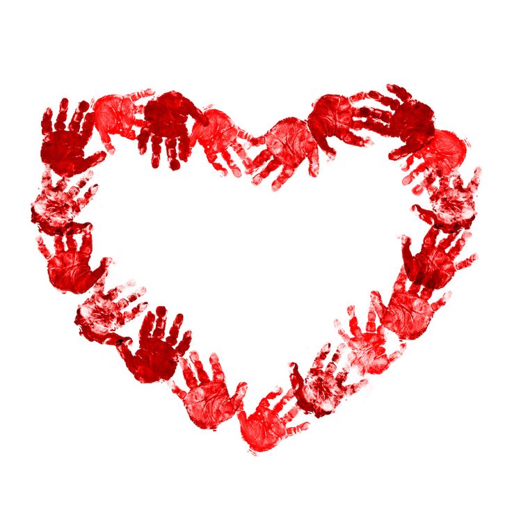 a heart made out of handprints on a white background