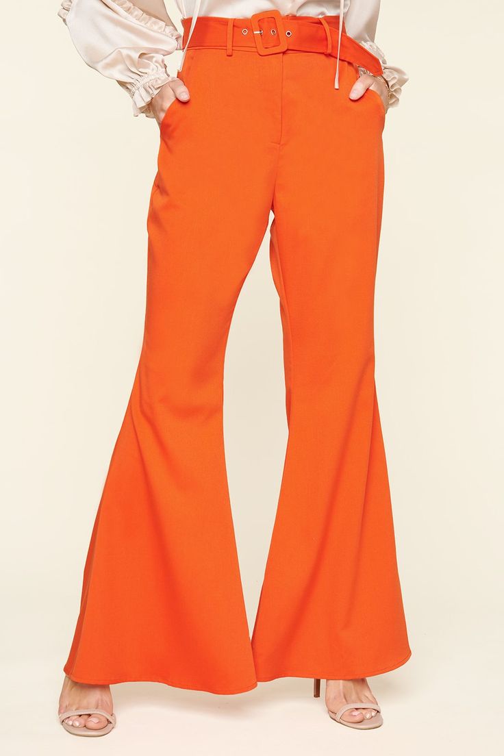 Do the hustle in the Power Moves Bell Bottom Pants that feature a high waist and slim fit throughout the hips and thighs. Side pockets are added at both sides and a covered buckle belt is added at the waist. Pair the pants with your favorite blouse, add some heels, and you're all set to go out.- Bell bottoms- Zipper fly- Covered buckle belt- High waisted- Comes in 6 colorsSize + Fit - Model is 5'9" and wearing size XS- Measurements taken from size S - Waist: 26 1/2"- Length: 32 3/8" fabricSelf: Chic Full-length Bottoms With Hip Pockets, Chic Full-length Pants With Hip Pockets, Stretch Pants With Belt Loops And Wide Leg, Belted Solid Bottoms For Workwear, Solid Belted Bottoms For Workwear, Trendy Flared Pants With Belt Loops, Stretch Wide Leg Full-length Pants With Belt Loops, Stretch Full-length Wide Leg Pants With Belt Loops, Stretch Full Length Wide Leg Pants With Belt Loops