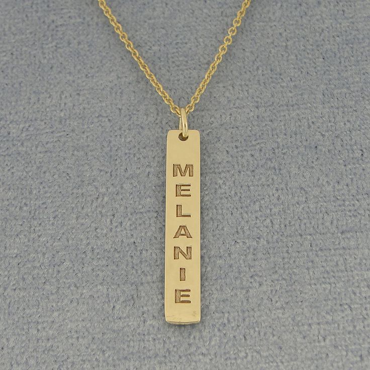 "*Bar Measurement: 1 inch (26 mm) X 3/16 inch (4.8 mm) Approx. *Pendant Thickness: 0.7 mm / 22 Gauges / 0.028\" *Up to 9 Letters, numbers or symbols. *Chain : Optional (1.0 mm Rollo chain 16, 18 or 20 inch). *Premium high end quality fine solid 10kt or 14kt solid yellow or white gold vertical bar necklace with high polished finish and deeply laser engraved your name or word and cut out by latest technology laser machine, top quality guaranteed." Personalized Gold Jewelry For Memorial, Personalized 14k Gold Memorial Jewelry, Personalized 14k Gold Jewelry For Memorial, 14k Gold Engraved Nameplate Jewelry, Personalized Gift Rectangular 14k Gold Jewelry, 14k Gold Rectangular Pendant Jewelry For Personalized Gift, Stamped Yellow Gold Brass Jewelry, Gold Stamped Jewelry For Commemoration, Everyday Yellow Gold Jewelry With Hallmarks