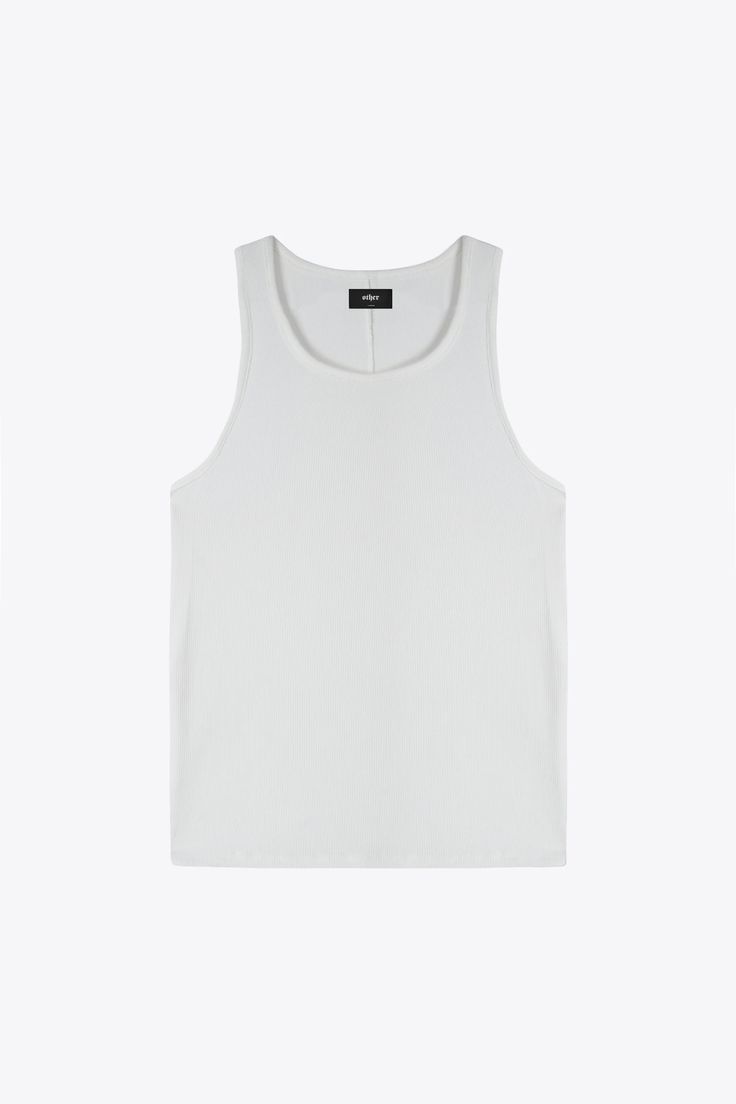 Introducing the Beater, the perfected essential vest. Crafted from 100% Ribbed Rayon Basic Sleeveless Everyday Vest, Basic Sleeveless Vest For Everyday, Basic Everyday Sleeveless Vest, Classic Sleeveless Tops For Everyday, Classic Cotton Vest Top, Solid Color Tank Vest For Everyday, Everyday Solid Color Tank Vest, Classic Tank Top For Layering, Basic Solid Color Vest For Everyday