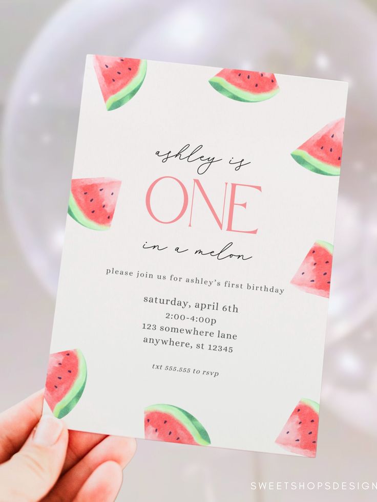 someone holding up a watermelon themed birthday party card that says, slayy is one on melon