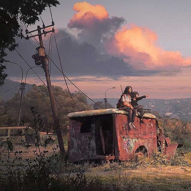 two people sitting on top of an old truck in the middle of a rural area