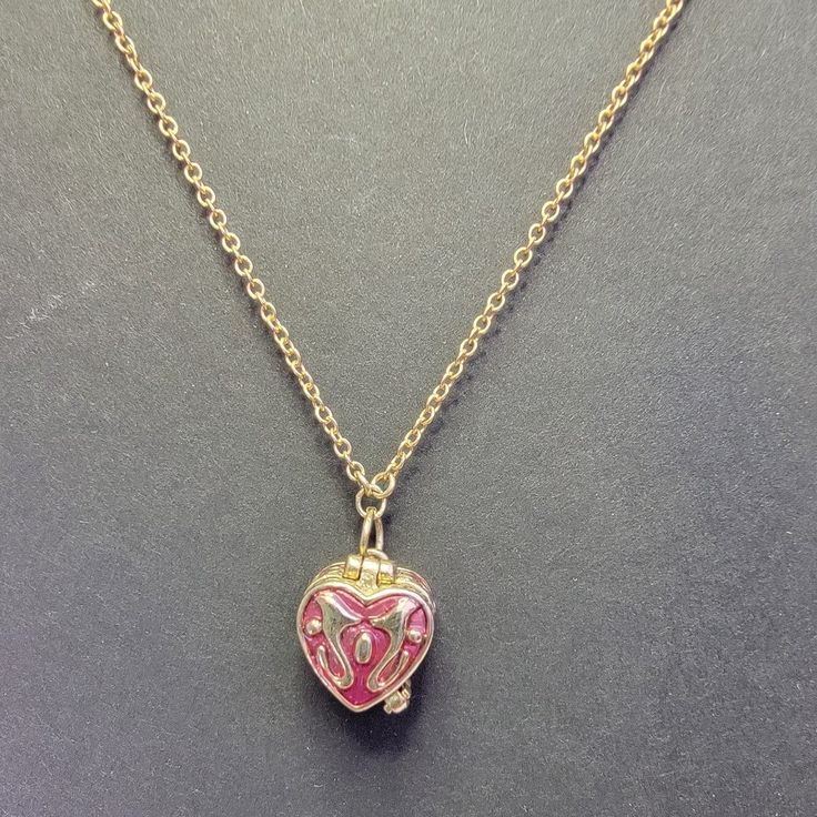 Nwot Absolutely Gorgeous Very Rare Unique Vintage Gold/Dk Pink Prayer Locket Necklace 14" Chain See All 6 Pics All My Listing Are Cross Posted Check Out My Listing Hello Kitty Items, & So Much Much More Listed All The Time Ty Pink Heart-shaped Jewelry With Clavicle Chain, Pink Heart-shaped Clavicle Chain Jewelry, Pink Heart Necklace With Clavicle Chain For Valentine's Day, Rose Gold Heart-shaped Chain Necklace, Valentine's Day Pink Heart Necklace With Clavicle Chain, Pink Round Pendant Jewelry With Heart Charm, Pink Heart Charm Round Pendant Jewelry, Pink Heart Pendant Necklace With Clavicle Chain, Pink Round Pendant With Heart Charm