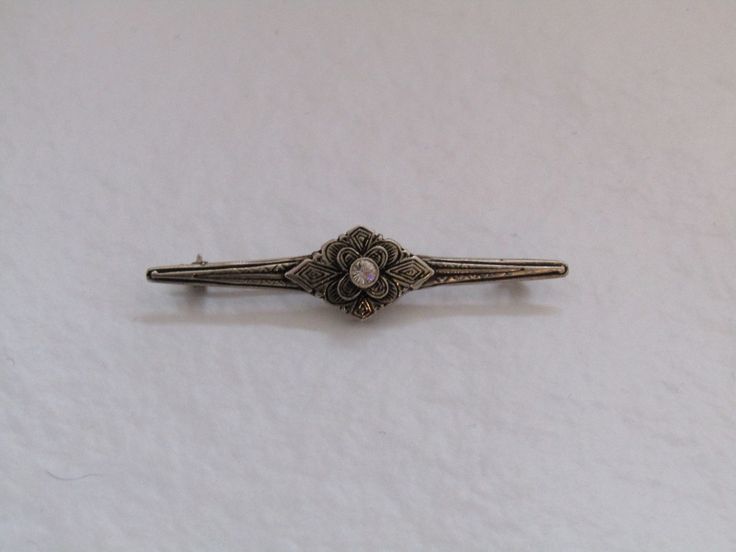 antique sterling brooch pin - brooch pin vintage - silver brooch - silver pin - antique silver pin for women - brooch silver - for her Very good condition, no repairs or broken parts. Excellent women's pin for gift or collection! It measures 6, 4 cm in orizontal length. All our packages and parcels are registered, you will be also provided with tracking number. Please ask if you have any questions. Visit our shop for more collector's items. https://www.etsy.com/shop/prestigiousantiques?ref=hdr Classic Silver Filigree Brooches, Silver Art Deco Brooches For Wedding, Silver Art Deco Wedding Brooch, Silver Art Deco Wedding Brooches, Formal Silver Brooch With Screw Back, Silver Engraved Brooches For Formal Occasions, Victorian Silver Wedding Brooches, Elegant Silver Brooch With Screw Back, Formal Silver Brooches With Screw Back