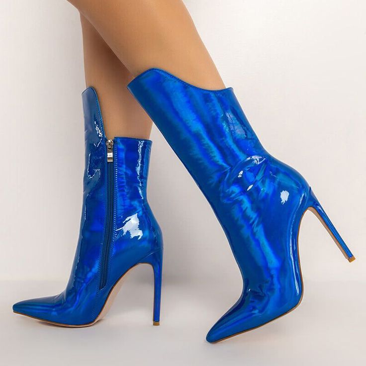 Elevate your style with FSJ's Royal Blue Holographic Pointed Toe Stiletto Heel Mid Calf Boots. These statement boots boast a captivating holographic finish, sleek pointed toes, and sky-high stiletto heels for a blend of glamour and edge that commands attention. Color: Royal blue Material: Patent leather Heel Type: Stiletto heel Heel height: 4.72" / 120 mm approx Product measurements were taken using size 8. Please note that measurements may vary by size. Toe: Pointed toe Handcrafted US sizing. Fits true to size. Fitted High Ankle Patent Leather Heeled Boots, High Ankle Fitted Patent Leather Heeled Boots, Formal Blue Pointed Toe Boots, Blue Pointed Toe Boots For Formal Occasions, Formal Fitted Blue Boots, Blue High Heel Boots With Reinforced Heel, Blue High Heeled Boots With Reinforced Heel, Blue High Heel Boots For Evening, Blue Pointed Toe Heeled Boots For Party