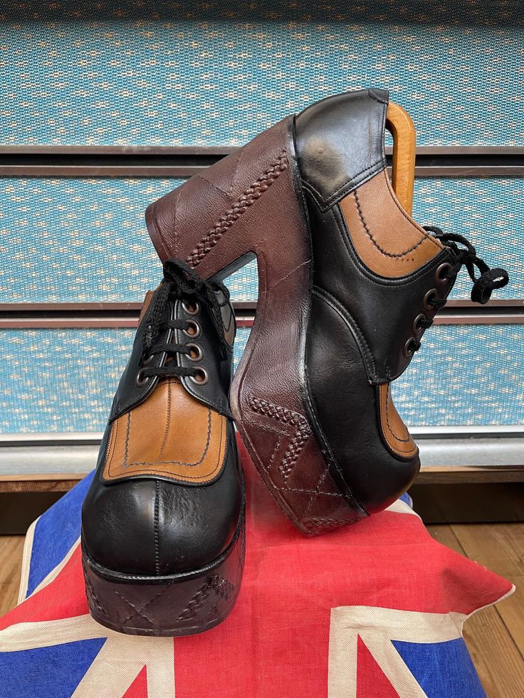 "Absolutely stunning pair of 70s Glam rock platform shoes. Noddy holder from Slade would have been proud of these beauties 👌. Made by a famous name of the time \"Kingsway\" that made many a different styles around this time. Mainly black leather upper with light tan and darker brown platform sole and heel that seems to be formed of one kinda Crepe rubber block with lovely stitching detail on both sides and the rear,these will not wear down and will last many more years,the shoes themselves have not been worn much and are in outstanding condition. Heel measures near 5\" inches high and the sole at widest point is just over 2\" inches. Fits a uk size 8 USA 9 Euro 42. Please check out my other vintage pieces  My Generation vintage on instagram and facebook" 70s Fashion Vintage, 70s Glam Rock, 1970s Glam, Giuseppe Zanotti Boots, Noddy Holder, 70s Glam, Mens Loafers, Vintage Ysl, Vintage Mom