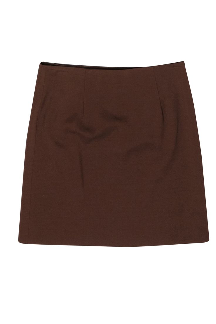 Wrap yourself in some fab fall style with this chic little skirt from Tara Jarmon! Created in a trendy mini silhouette with an easy wrap closure in a warm wool blend, this button-up beauty is perfect for wherever the season takes you! Whether you’re off to the pumpkin patch or gathering around the table for Thanksgiving dinner, pair this with a cozy turtleneck and your best booties and you’ll be styling and profiling all autumn long! Size S (EU 36) Shell: 52% Viscose, 40% Wool, 6% Nylon, 2% Span Elegant Brown Mini Length Bottoms, Elegant Brown Mini Bottoms, Elegant Solid Mini Skirt For Fall, Solid Color Lined Mini Skirt For Fall, Fitted Pencil Skort For Fall, Fitted Pencil Skirt Skort For Fall, Fitted Solid Mini Skirt For Fall, Elegant Brown Skort For Spring, Elegant Brown Mini Length Skort