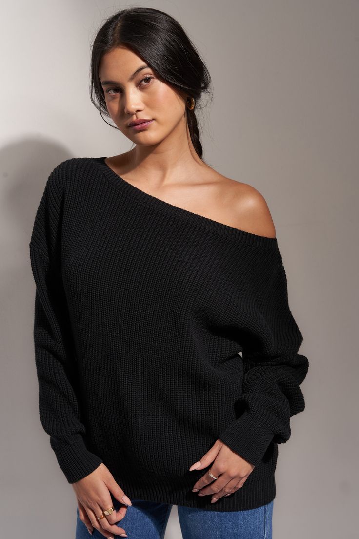 100% cotton, slightly oversized, snuggly but stylish; it's no wonder this shoulder-revealing sweater is a totally must have. Twist Back Sweater, Oversized Off The Shoulder Sweater, Oversized Black Sweater Outfit, Over The Shoulder Sweater, Black Off The Shoulder Sweater, Off The Shoulder Sweaters, Black Sweater Outfit, Oversized Black Sweater, Slouchy Sweater