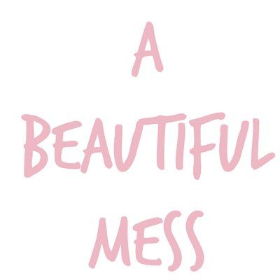 a beautiful mess written in pink on a white background