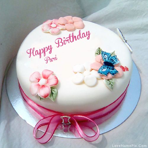 a birthday cake with flowers and butterflies on it