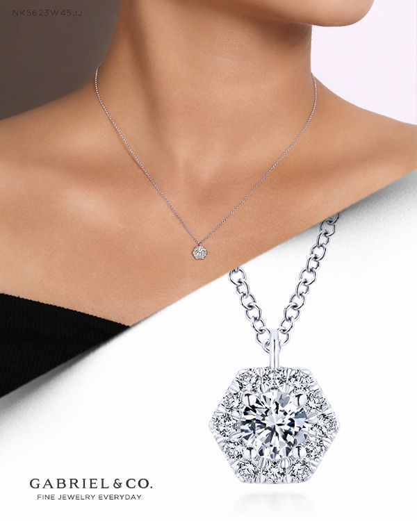 Ideal for those who love timeless styles with a twist, this 0.37ct diamond necklace truly sparkles. A central round cut diamond is intensified by a chic hexagonal halo for modern radiance. NK5623W45JJ #GabrielNY #DiamondJewelry #FineJewelry #GabrielAndCo #UniqueJewelry #FashionJewelry#GiftIdeas#UniqueGifts #DiamondJewelry #Jewelry #Necklaces #DiamondNecklace #GoldNecklace #HaloPendantNecklace Luxury Halo Necklace In Fine Jewelry Style, Luxury Cubic Zirconia Diamond Necklace With Halo Setting, Luxury Necklace With Halo Design, Luxury Halo Design Necklaces, Luxury Halo Necklace For Gift, Luxury Classic Necklaces With Halo Setting, Luxury Halo Design Necklace, Luxury Diamond Halo Necklace For Anniversary, Luxury Solitaire Necklace With Halo Design