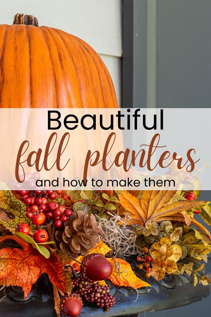 a pumpkin sitting on top of a table with leaves and acorns around it