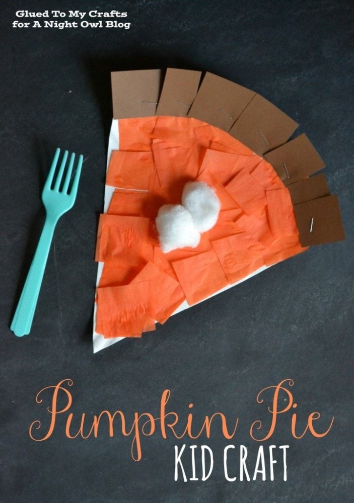 a paper plate that has a pumpkin pie on it and a fork next to it