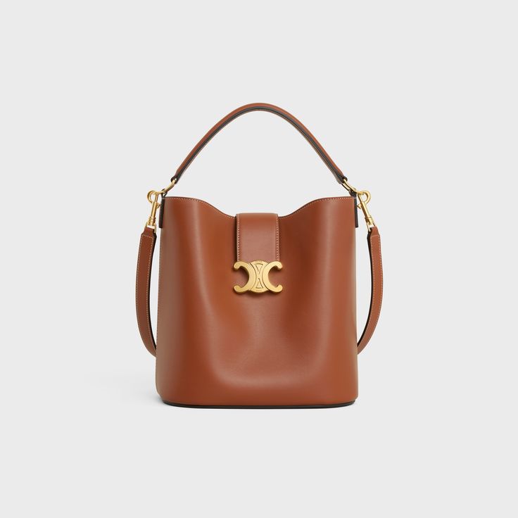 MEDIUM LOUISE BAG IN SMOOTH CALFSKIN - TAN | CELINE Celine Canvas Bag, High-end Tan Shoulder Bag With Removable Pouch, High-end Bucket Bag With Detachable Strap Satchel, High-end Bucket Bag Satchel With Detachable Strap, High-end Bucket Satchel With Detachable Handle, High-end Shoulder Bucket Bag With Gold-tone Hardware, High-end Satchel With Bucket Shape And Detachable Handle, High-end Bucket Bag With Detachable Handle, High-end Bucket Bag