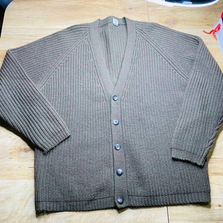 Aldo Mens Pure Wool V-Neck Button Down Knit Cardigan Sweater Color - Gray Size - XL Pit to pit- 23” Shoulder to hem- 27.5" Pre Owned condition. Please see photos for measurements. Shipped quickly with first class shipping. Features: • Cardigan •grandpa core Size: Mens XL Condition: Pre-Owned Good Vintage V-neck Cardigan For Layering, Casual Wool V-neck Sweater With Button Closure, Vintage Brown V-neck Cardigan, Vintage Wool V-neck Cardigan, Vintage V-neck Cardigan With Button Closure, Vintage V-neck Cardigan With Buttons, Grandpa Core, Knit Cardigan Sweater, Button Cardigan