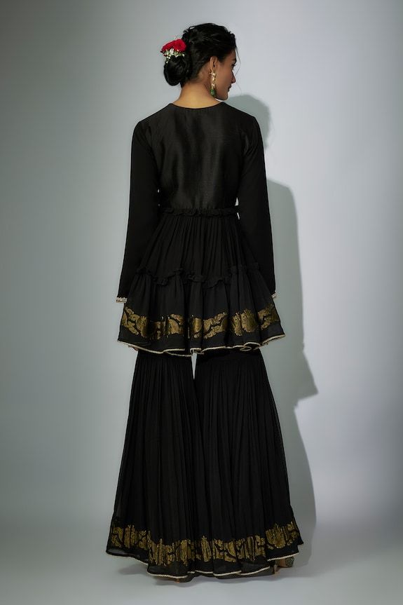 Black peplum anarkali with zardosi and marodi embroidered neckline. Paired with a gharara and embroidered dupatta. - Aza Fashions Designer Peplum Salwar Kameez For Eid, Anarkali Peplum Kurta For Festivals, Festive Anarkali Kurta With Peplum Style, Peplum Salwar Kameez For Eid, Anarkali Peplum Kurta For Festive Occasions, Designer Eid Anarkali Set With Peplum Shape, Traditional Designer Peplum Salwar Kameez, Peplum Salwar Kameez With Zari Work For Eid, Traditional Designer Salwar Kameez With Peplum