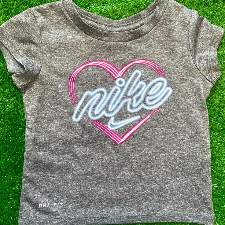 Nike Toddler Shirt Nwot Nike Pink Tops With Letter Print, Pink Nike Tops With Letter Print, Nike Pink T-shirt With Graphic Print, Sporty Short Sleeve Pink Shirt, Pink Cotton Sporty Shirt, Sporty Pink Cotton Shirt, Fitted Pink Cute Shirt, Cute Nike Summer Tops, Nike Pink Tops For Spring