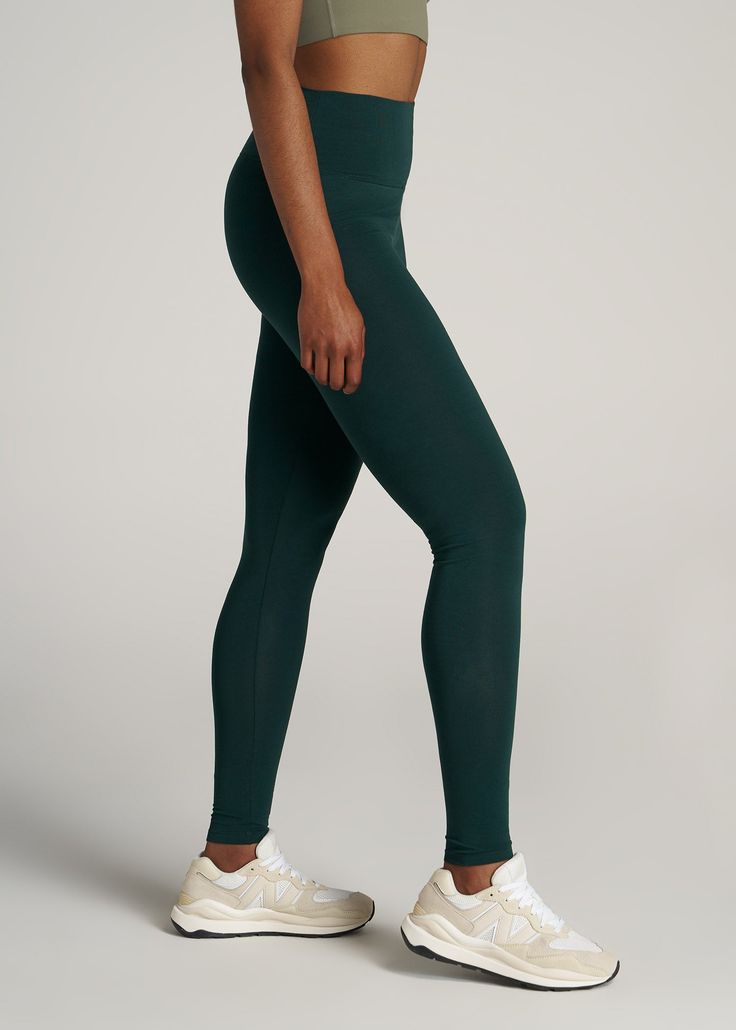 About Our Tall Women's Leggings Maximum comfort meets maximum length. You'll want to wear these tall women's leggings all day long. We thoughtfully designed this pair to be a staple in your everyday collection that you can reach for time and time again. They're created with your long legs and torso in mind, with an extended inseam that'll go past your ankles and a flattering high-rise fit with a wide waistband. Our long leggings for tall women are made of a lightweight cotton and spandex blend t Green Stretch Seamless Leggings, Comfortable Full-length Yoga Tights, Comfortable Full Length Yoga Tights, Full Length Green Leggings Athleisure, High Stretch Full Length Green Leggings, Sporty Full-length Seamless Leggings, Sporty Seamless Full-length Leggings, Full Length Tights For Pilates In Fall, Fall Pilates Full-length Tights