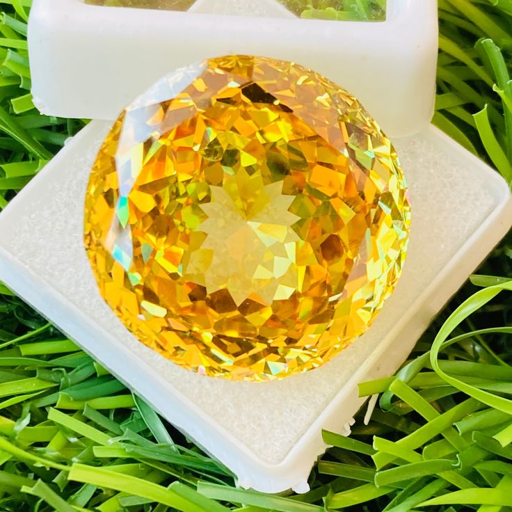 Welcome To, VictoriaDiamondGems Yellow Topaz High Quality Beautiful Amazing Gemstone Pendant Size round shape Gemstone Size-22x22x11MM carat-69.75 and extra gift  Type Of Gemstone:- Yellow  topaz  Gemstone:-  Topaz Dimensions --------- Length: 22mm (approximately) Width:- 22mm (approximately) Depth:: 11mm (approximately) Carat-69.75 Shape:  Round Handling:- 1-2 Working Days Natural/ Lab Created:-  Lab Created ThankYou For Visit My Shop Luxury Round Birthstone Gemstones, Luxury Birthstone Gemstones, Round Topaz Birthstone Gemstones, Gold Round Gemstones With Large Stone, Round Diamond Gemstone Gift, Luxury Gemstones For Gifts, Faceted Round Topaz Jewelry, Round Faceted Topaz Jewelry, Round Yellow Citrine Gemstones