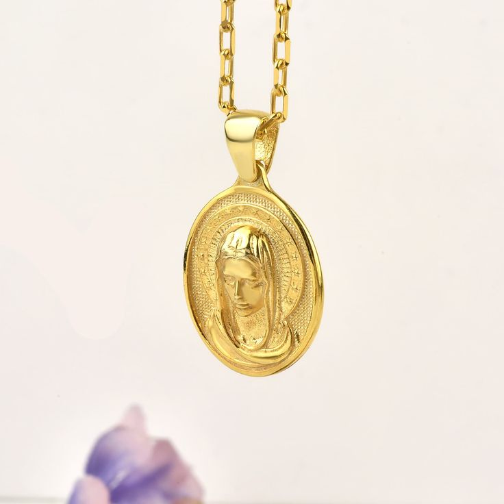 Holy Mother Virgin Mary necklace for Wife, 10k or 14K gold religious pendant necklace for mom, Catholic sterling silver necklace for her Our products are handmade and have a minimal design. All products are made of gold and silver, that is, precious and high-quality materials. Our products will complement your combinations for daily use or on special occasions and add elegance to you. You can also make your loved ones happy by gifting this beautiful product to them. As Therollerstone Team, we wi Personalized Spiritual Jewelry, Spiritual Pendant Jewelry For Mother's Day, Gold Plated Spiritual Round Pendant, Mother's Day Gift Jewelry With Miraculous Medal, Oval Pendant Necklace For Mom, Spiritual Yellow Gold Necklaces, Spiritual Pendant Necklace As Gift For Mom, Miraculous Medal Jewelry Gift For Mother's Day, Miraculous Medal Necklace For Mother's Day Gift