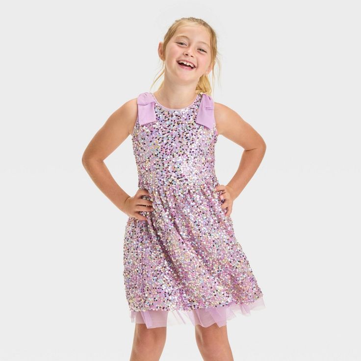 Let your child sparkle in this Sleeveless Sequin Tulle Dress from Cat & Jack™. Made of 100% recycled polyester, this knee-length dress features a front and back U-neckline with a back half-length zipper for easy on and off, and it features allover sequins for a touch of shine. Plus, this sleeveless dress has tie detailing at the shoulders for a chic finishing touch. Cat & Jack™: Designed for all children so you can trust it's made for yours. Kids Garments, Velour Dress, Kids Outfits Girls, Halloween Dress, Girls Long Sleeve, Trending Dresses, Dress Romper, Tulle Dress, Knee Length Dress