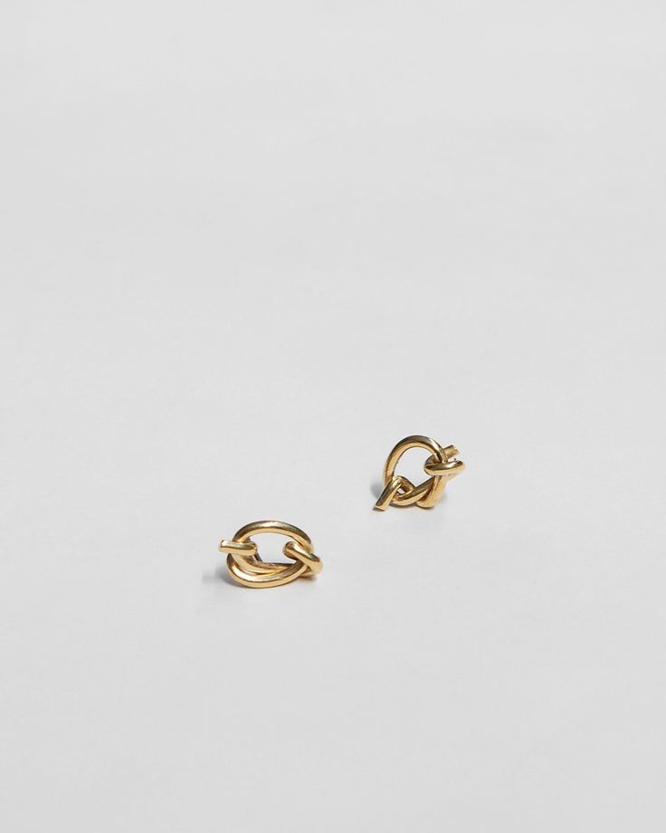 Perfectly asymmetrical stud earrings, individually hand sculpted in wax wire, then cast in recycled 14k gold. Earrings measure approximately 3/8" in diameter. Solid 14k gold posts and backs. Availability: Currently in stock and ready ship. Knot Earrings, Gold Earrings, Knot, Wax, Stud Earrings, Gold