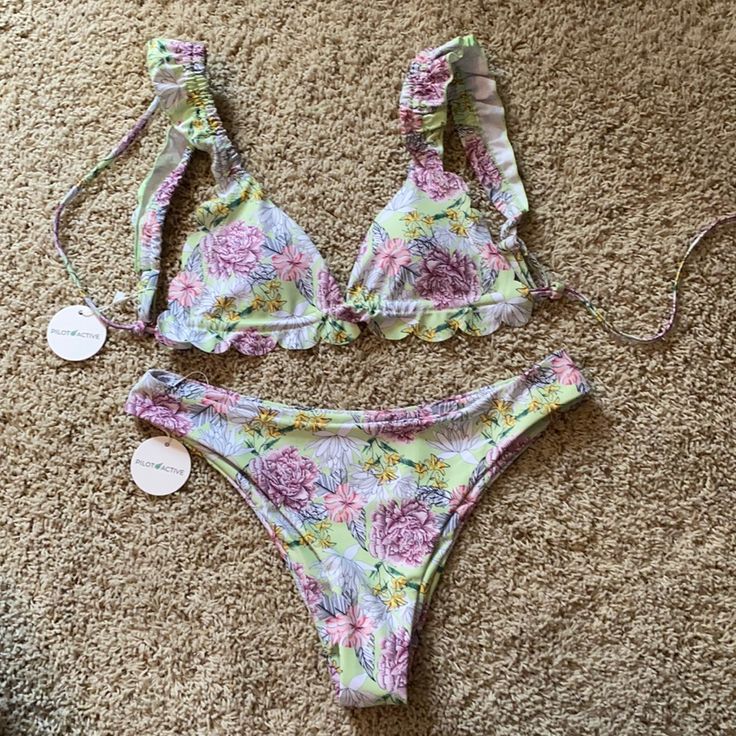 Top Size: M // Bottom Size:L Purple Beachy Swimwear For Spring, Purple Swimwear For Spring, Casual Purple Swimwear With Triangle Top, Casual Printed Purple Swimwear, Purple Floral Print Summer Swimwear, Casual Purple Printed Swimwear, Summer Printed Purple Swimwear, Purple Floral Print Swimwear For Vacation, Purple Printed Summer Swimwear