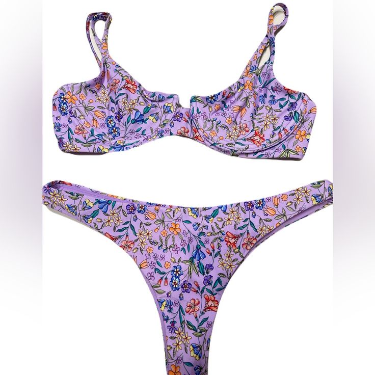 B Swim Aruba Top In Beachfront Bloom Print. Size Medium. Stock Photo To Show Style And Color And Fit. Last Few Personal Gallery Pics Are Of Actually Swim Suit. This Bombshell Bra Will Flatter Any Shape And Provide Just The Right Amount Of Support. Adjustable Straps And Underwire Make The Aruba Top Just As Comfortable As It Is Cute And Classy. Underwire Adjustable Straps Hook Closure At Back Bottom Is The Havana Bottom. Also Medium. Color Is Beachfront Bloom. Pics To Show Style And Fit. The Havan Purple Swimwear For Sunbathing During Beach Season, Purple Triangle Top Swimwear For Beachwear, Purple Swimwear For Sunbathing In Summer, Summer Purple Swimwear For Sunbathing, Summer Lavender Swimwear For Swimming, Fitted Purple Swimwear For Vacation, Purple Beachy Swimwear For Summer, Beachy Purple Swimwear For Summer, Purple Beachy Swimwear For Spring