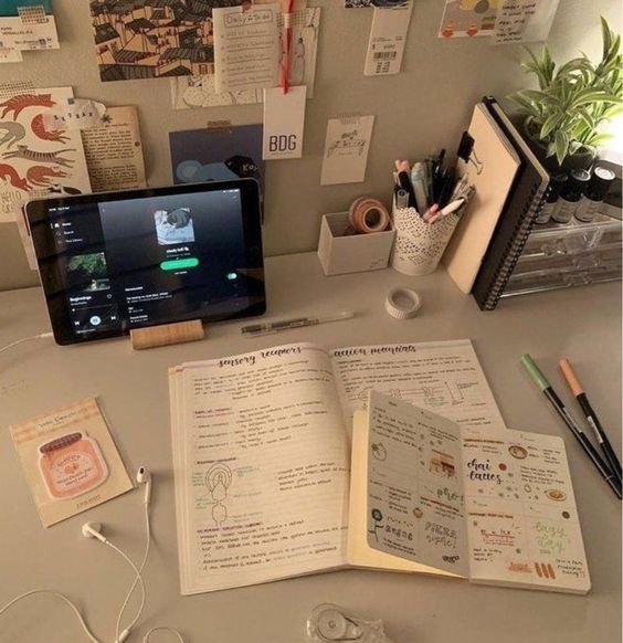 an open book sitting on top of a desk