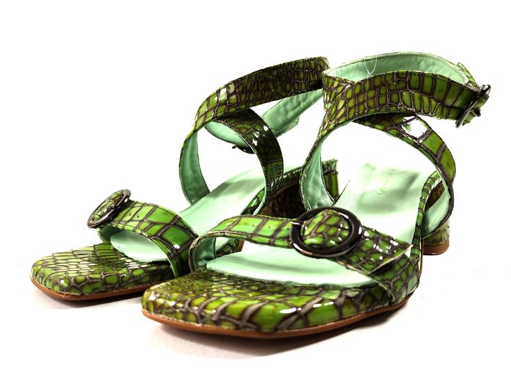 Handmade pistachio green croco leather sandals in chunky low heel. Modern strappy design with square toe and adjustable straps, that embrace and flatters all feet types! Their low block heel and their very soft insole offer true comfort. Genuine leather on the upper and inner parts, soft leather lining and antislip elastic rubber sole. High quality shoes, guaranteed to last for a long long time! PRODUCT INFO Color: green Upper material: 100% leather Linning: 100% leather Heel: leather wrapped He Trendy Green Block Heel Sandals, Trendy Green Block Heels With Round Toe, Green Sandals With Padded Low Heel, Trendy Green Slingback Sandals With Round Toe, Green Buckle Slingback Sandals For Summer, Summer Green Slingback Sandals With Buckle, Green Buckle Closure Slingback Sandals For Summer, Trendy Green Heels With Heel Strap, Trendy Green Heels With Buckle Closure