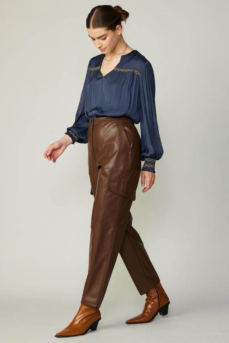 A sleek take on the utility trend. These vegan leather cargo trousers have porkchop pockets at the front, plus streamlined flap pockets at the sides. It's elasticized at the back waistband for added comfort. •Zip fly with button closure •Porkchop pockets at front •Flap pockets at sides •Elasticized back waistband DIMENSIONS •Standard: 28" L of inseam Item number 2370241 Leather Cargo Pants With Side Pockets For Work, Fall Utility Leather Pants In Cargo Style, Fall Utility Leather Cargo Pants, Utility Leather Cargo Pants For Fall, Utility Cargo Style Leather Pants For Fall, Fall Leather Cargo Pants With Side Pockets, Leather Pants With Faux Front Pockets For Work, Leather Workwear Bottoms With Pockets, Leather Cargo Pants With Side Pockets For Fall