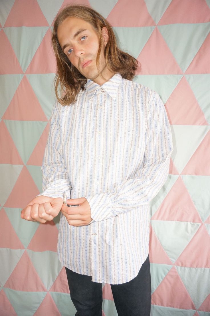 A super quality shirt, have a close look at the fabric and you'll see how the various different colours fade into each other in a stripy kind of way! Alex is 5'11 and usually wears M/L.  Here at RetroReflector we personally hand pick all our items and we don't buy any items in a condition we wouldn't be happy to receive ourselves. Vintage items may show some natural signs of wear and age but if there's any major wear such as a hole or stain we'll always mention it and provide a photo. We also wash anything dirty using eco friendly detergents.  If you have any questions at all regarding this item, send us a message and we'd love to help! Yarn-dyed Striped Collared Shirt, Striped Yarn-dyed Cotton Shirt, Yarn-dyed Striped Cotton Shirt, Striped Yarn-dyed Button-up Shirt, Yarn-dyed Striped Button-up Shirt, Dress With Corset, Denim Midi Dress, 90s Denim, Strappy Top