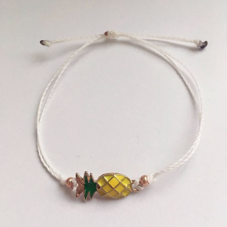 This item is ready to ship! Customization is NOT available for this listing. If you would like something custom, please send me a message! This pineapple wax cord bracelet is the perfect gift for the fruit lover in your life. It also happens to be a symbol for those going through infertility, and would be a great gift for those loved ones as well! Completely waterproof, adjustable so it will fit any size wrist. Just pull to close. All of my friendship bracelets are made with 100% cotton embroide White Braided Bracelets With Sliding Knot For Summer, Summer White Braided Bracelets With Sliding Knot, White Braided Bracelets For Summer Vacation, White Braided Bracelet With Sliding Knot For Vacation, White Braided Bracelet With Sliding Knot For Summer, White Sliding Knot Jewelry For Summer, White Jewelry With Sliding Knot For Summer, White Summer Jewelry For Friendship, White Friendship Bracelet With Sliding Knot For Summer