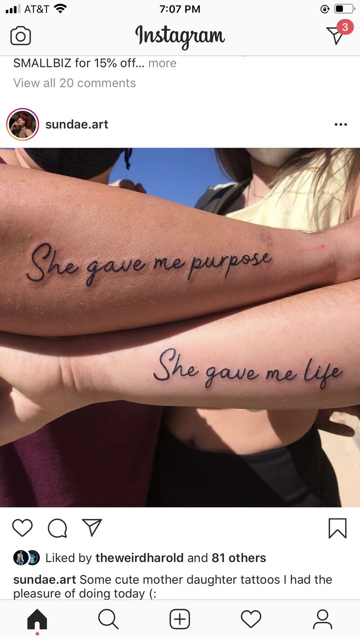 two people with tattoos on their arms and one has the words she gave me purpose