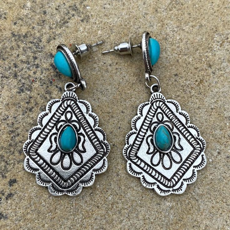 New Earrings! Never Been Worn. Add A Splash Of Effortless Style With These Boho Dangle Earrings. You Will Make A Statement Whether You Pair Them With A T-Shirt And Jeans Or Something A Little Dressier. Silver Tone Bohemian Style Dangle Earrings With Faux Turquoise Colored Stones. Post Back. Lightweight. Measures Almost 1 3/4 Inch Long. Fast Shipping! Adjustable Blue Bohemian Teardrop Earrings, Turquoise Chandelier Earrings For Festivals, Southwestern Style Teardrop Dangle Earrings, Southwestern Nickel-free Teardrop Earrings, Southwestern Turquoise Teardrop Earrings, Blue Bohemian Teardrop Earrings Nickel Free, Aztec Jewelry, Gold Chandelier Earrings, Abstract Earrings