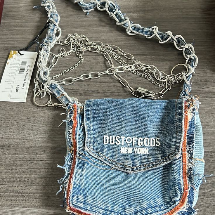 Very Cool One Of A Kind Dust Of Gods New York Denim Purse With Chains. Interior Is A Red Bandana. This Is A Brand Worn By Many Celebrities. Hard To Find. Upcycle Purses Ideas, Jean Pocket Purse, Dust Of Gods, Purses 2024, Fashion Workshop, Upcycle Denim, Denim Clutch Bags, Recycled Denim Bags, Blue Jean Purses