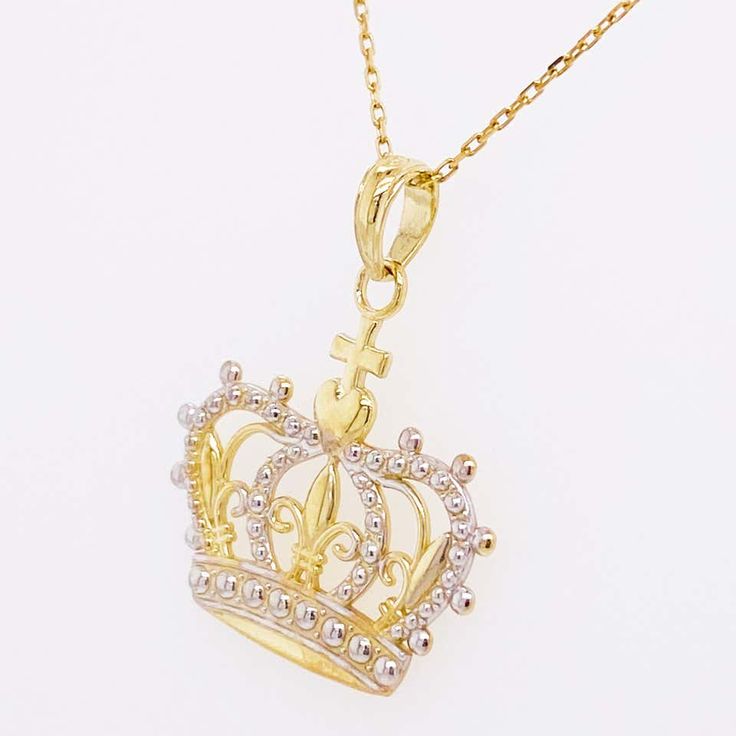 Queen Crown Pendant - made for a queen! This exquisite 14K yellow and white gold pendant has an ornate crown design that resembles a gorgeous Renaissance crown fit for a queen or king. This crown also features many hidden symbols, such as a cross, heart, and fluer de lis. This romantic crown pendant is worn on an 18 inch chain. It would make the perfect gift for your loved one or yourself!The details for this beautiful necklace are listed below:Metal Quality: 14K Yellow and White GoldPendant Sty Regal Gold Jewelry With Crown Design, Regal Crown Design Jewelry For Gift, Regal Crown Design Jewelry Gift, Hidden Symbols, Princess Royalty, Fluer De Lis, Crown Pendant, Queen Princess, Cross Heart