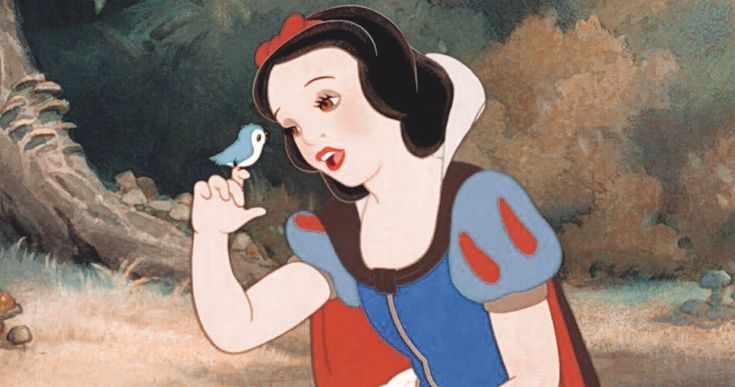 snow holding a bird in her right hand