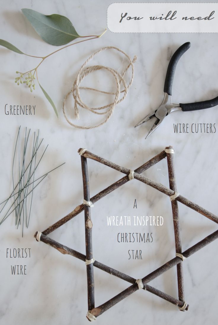 the star of david is made out of branches, wire, and other things to make it look like an ornament