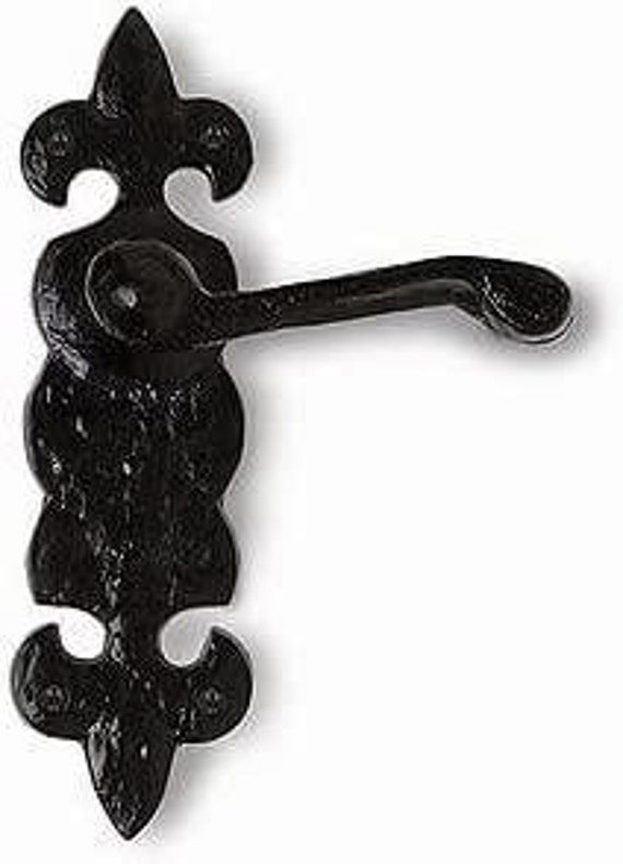 a black iron door handle on a white background