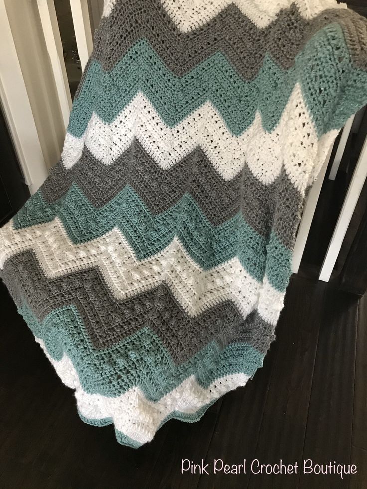 Crochet Chevron Baby Blanket | Teal and Grey Baby Blanket | White and Teal Crochet Blanket | Crochet Chevron Baby Afghan | Teal Baby Nursery  Add colour and texture to your baby's nursery with this beautiful chevron blanket. Crocheted in alternating stripes of grey, white and soft teal with a sharp peak and valley design style.  Material : 100% acrylic yarn  Care: machine washable in low temperature setting, lay flat to dry. Do not iron. Teal Crochet Blanket, Teal Baby Nursery, Grey Baby Blanket, Crochet Chevron Baby Blanket, Teal Crochet, Gender Neutral Blanket, Chunky Yarn Blanket, Crochet Chevron, Hand Crocheted Blanket