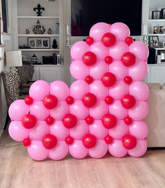 the balloons are arranged in the shape of letters